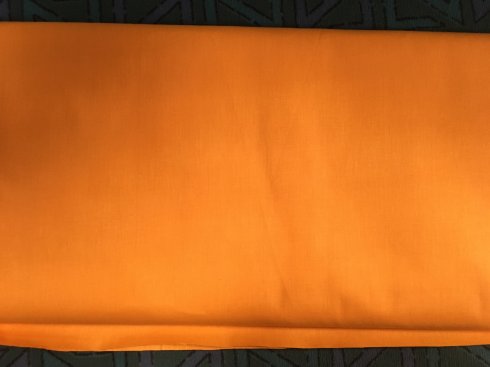 látka Uni oranžová šíře 140cm/100%bavlna